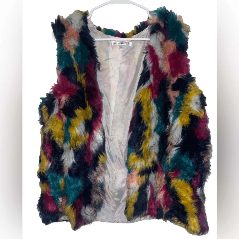 Say what ? Colorful faux fur vest .